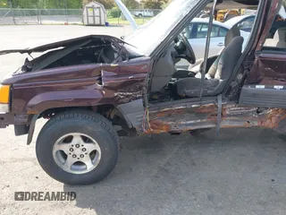 1998 Jeep Grand Cherokee Laredo с VIN 1J4GZ58S1WC103355, выставлен на аукционе IAAI как лот 42128472 с пробегом Не указан миль и . История ставок и продаж доступна на DreamBid. Изображение 16.
