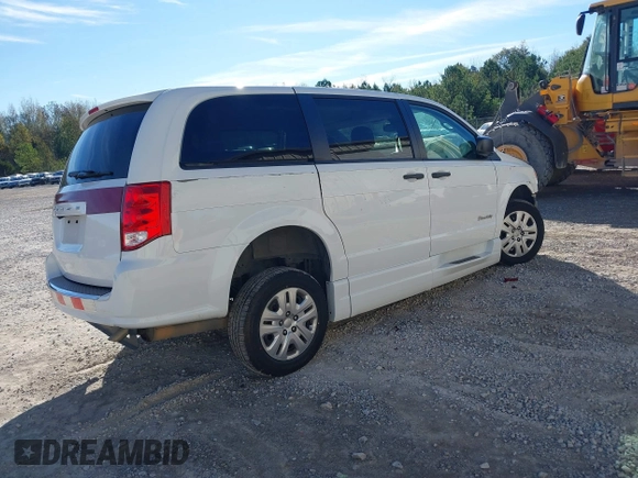 2019 Dodge Grand Caravan SE with VIN 2C7WDGBG7KR803126, listed as a IAAI auction lot 40835937 with 63,100 mi miles and . Bid and sale history available at DreamBid. Image 4.