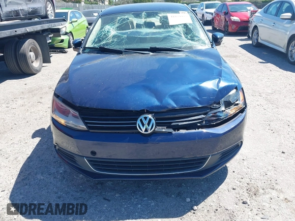 2013 Volkswagen Jetta SE z VIN 3VWDX7AJ0DM396590, wystawiony jako IAAI lot #41829922 z przebiegiem 133 356 mil mil oraz . Historia ofert i sprzedaży dostępna na DreamBid. Obrazek 6.