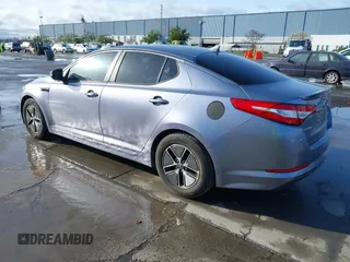 2012 Kia Optima Hybrid with VIN KNAGM4AD6C5015831, listed as a IAAI auction lot 41807913 with 156,197 mi miles. Bid and sale history available at carsss.com. Image 3.