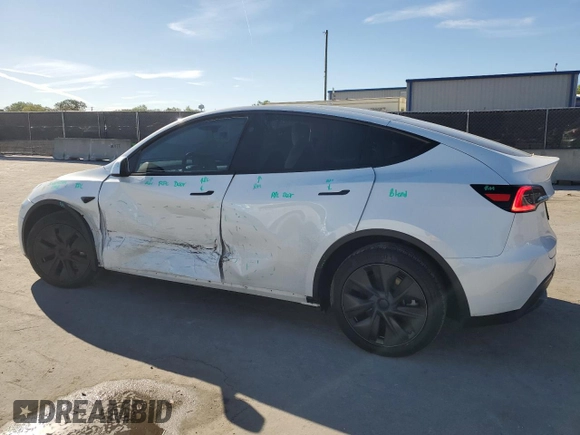 2024 Tesla Model Y with VIN 7SAYGDED3RF130826, listed as a Copart auction lot 47735185 with 10,467 mi miles and Non Repairable. Bid and sale history available at DreamBid. Image 2.
