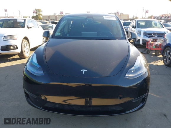 2024 Tesla Model Y Long Range with VIN 7SAYGDEEXRA216186, listed as a IAAI auction lot 41106653 with 25,331 mi miles and . Bid and sale history available at DreamBid. Image 12.