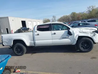 2022 Toyota Tacoma SR5 with VIN 3TMDZ5BNXNM122169, listed as a IAAI auction lot 41992758 with 36,686 mi miles and . Bid and sale history available at DreamBid. Image 13.