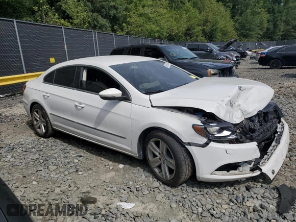 2014 Volkswagen CC Sport with VIN WVWBN7AN3EE528302, listed as a Copart auction lot 69636034 with 77,332 mi miles and Salvage Title. Bid and sale history available at DreamBid. Image 4.