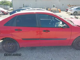2000 Ford Focus LX with VIN 1FAFP33PXYW413249, listed as a IAAI auction lot 42561661 with 253,875 mi miles and . Bid and sale history available at DreamBid. Image 13.