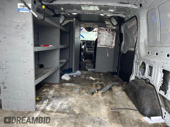 2020 Ford Transit Cargo with VIN 1FTYE1Y85LKB46360, listed as a IAAI auction lot 42599789 with 103,109 mi miles and . Bid and sale history available at DreamBid. Image 2.