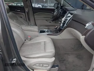 2014 Cadillac SRX Performance Collection with VIN 3GYFNCE33ES570472, listed as a IAAI auction lot 41971511 with 200,811 mi miles. Bid and sale history available at carsss.com. Image 5.
