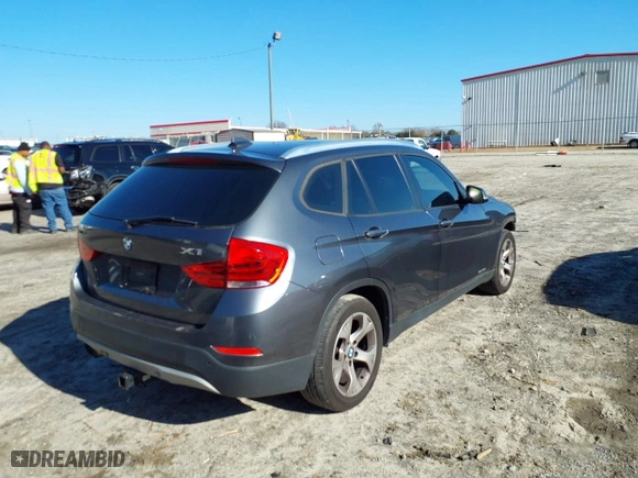 2014 BMW X1 sDrive28i with VIN WBAVM1C51EVW49093, listed as a IAAI auction lot 41500647 with 111,036 mi miles. Bid and sale history available at carsss.com. Image 4.
