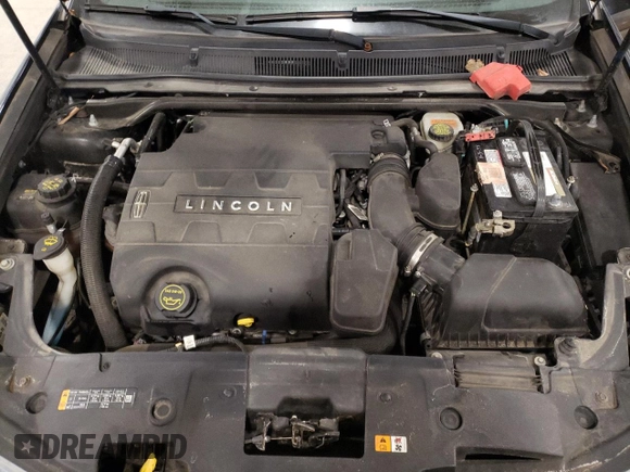 2014 Lincoln MKS with VIN 1LNHL9DK3EG611354, listed as a Copart auction lot 49008525 with 114,232 mi miles and Salvage Title. Bid and sale history available at carsss.com. Image 12.