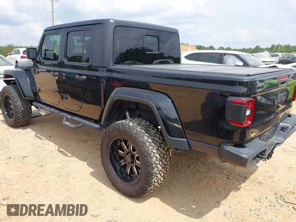2021 Jeep Gladiator Willys with VIN 1C6HJTAG7ML514114, listed as a IAAI auction lot 42399793 with 78,829 mi miles and . Bid and sale history available at DreamBid. Image 3.
