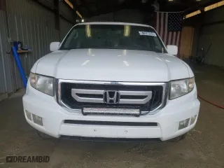 2010 Honda Ridgeline RTL with VIN 5FPYK1F57AB502049, listed as a Copart auction lot 87058684 with 228,156 mi miles and Clean Title. Bid and sale history available at carsss.com. Image 5.