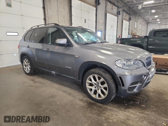 2012 BMW X5 35i z VIN 5UXZV4C58CL758466, wystawiony jako Copart lot #59799955 z przebiegiem 119 331 mil mil oraz Nie do naprawy • Non repairable. Historia ofert i sprzedaży dostępna na DreamBid. Obrazek 4.