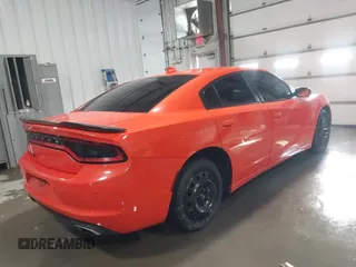 2019 Dodge Charger SXT with VIN 2C3CDXJG8KH712474, listed as a IAAI auction lot 41228985 with 117,229 mi miles and . Bid and sale history available at DreamBid. Image 4.