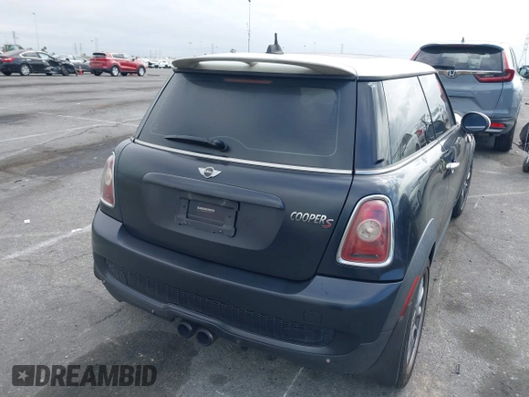 2007 MINI Hardtop S with VIN WMWMF73557TT80376, listed as a IAAI auction lot 42067228 with 174,262 mi miles and . Bid and sale history available at DreamBid. Image 4.