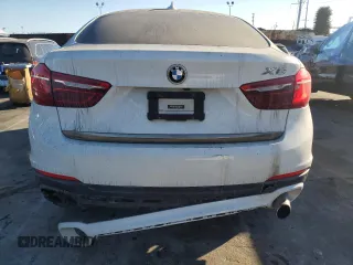 2016 BMW X6 sDrive35i with VIN 5UXKU0C56G0F92990, listed as a Copart auction lot 77191074 with 194,077 mi miles and Salvage Title. Bid and sale history available at carsss.com. Image 6.