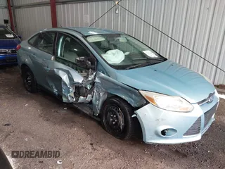 2012 Ford Focus SE z VIN 1FAHP3F24CL260001, wystawiony jako IAAI lot #42309542 z przebiegiem 222 062 mil mil oraz . Historia ofert i sprzedaży dostępna na DreamBid. Obrazek 1.