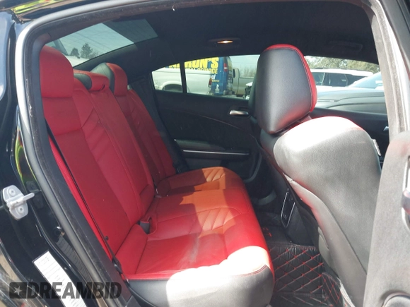 2019 Dodge Charger R/T with VIN 2C3CDXCT2KH575297, listed as a IAAI auction lot 41661339 with 119,854 mi miles and . Bid and sale history available at DreamBid. Image 8.