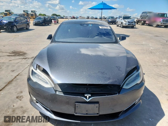 2016 Tesla Model S 90D z VIN 5YJSA1E40GF145137, wystawiony jako Copart lot #62027605 z przebiegiem 92 060 mil mil oraz Szkoda całkowita • Salvage title. Historia ofert i sprzedaży dostępna na DreamBid. Obrazek 5.