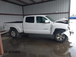 2010 Toyota Tacoma PreRunner with VIN 3TMKU4HN6AM026668, listed as a IAAI auction lot 41786901 with 267,485 mi miles and . Bid and sale history available at DreamBid. Image 14.