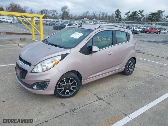 2013 Chevrolet Spark LT with VIN KL8CF6S99DC626296, listed as a IAAI auction lot 42047123 with 63,669 mi miles. Bid and sale history available at carsss.com. Image 2.