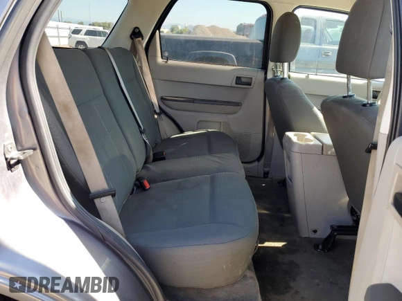 2009 Ford Escape XLS z VIN 1FMCU02729KA14846, wystawiony jako Copart lot #61658205 z przebiegiem 239 852 mil mil oraz Czysty tytuł • Clean title. Historia ofert i sprzedaży dostępna na DreamBid. Obrazek 10.