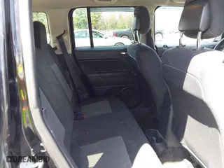 2014 Jeep Patriot Sport with VIN 1C4NJRBB1ED811019, listed as a IAAI auction lot 42039895 with 124,837 mi miles. Bid and sale history available at carsss.com. Image 8.