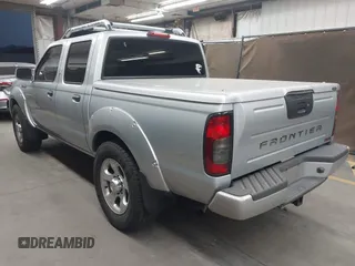 2001 Nissan Frontier z VIN 1N6MD27T01C384859, wystawiony jako IAAI lot #42058030 z przebiegiem 90 415 mil mil oraz . Historia ofert i sprzedaży dostępna na DreamBid. Obrazek 3.