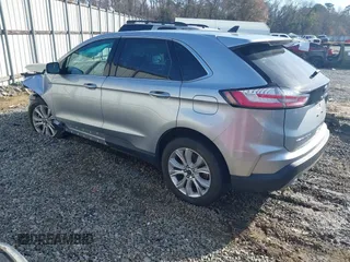 2022 Ford Edge Titanium z VIN 2FMPK4K95NBA38997, wystawiony jako IAAI lot #41467300 z przebiegiem 74 310 mil mil oraz . Historia ofert i sprzedaży dostępna na DreamBid. Obrazek 3.