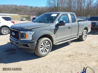 2018 Ford F-150 XL with VIN 1FTEX1EP7JFB50666, listed as a IAAI auction lot 41693673 with 149,570 mi miles. Bid and sale history available at carsss.com. Image 17.
