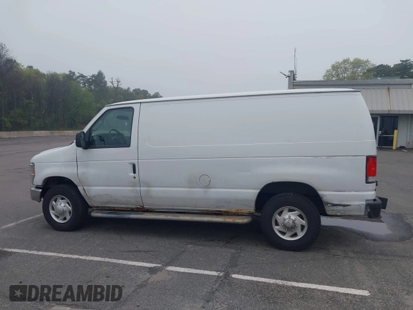 2012 Ford Econoline Cargo Recreational with VIN 1FTNE2EW8CDA64042, listed as a IAAI auction lot 42197470 with 130,647 mi miles. Bid and sale history available at carsss.com. Image 14.