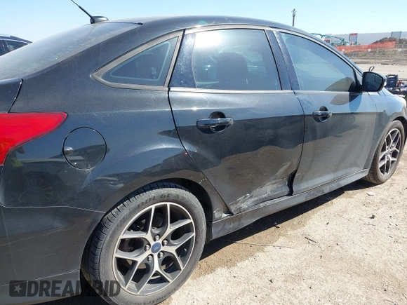 2015 Ford Focus SE with VIN 1FADP3F24FL313640, listed as a IAAI auction lot 41651845 with 146,390 mi miles. Bid and sale history available at carsss.com. Image 6.