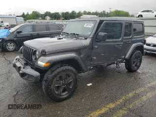 2020 Jeep Wrangler Unlimited Sahara Altitude with VIN 1C4HJXEM5LW293741, listed as a Copart auction lot 58801565 with 97,460 mi miles and Salvage title. Bid and sale history available at DreamBid. Image 1.