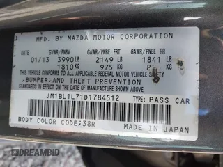 2013 Mazda 3 i Touring with VIN JM1BL1L71D1784512, listed as a IAAI auction lot 42057117 with 70,112 mi miles and . Bid and sale history available at DreamBid. Image 9.