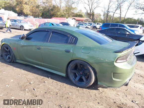 2019 Dodge Charger Scat Pack with VIN 2C3CDXGJ4KH572619, listed as a IAAI auction lot 40973015 with 40,148 mi miles and . Bid and sale history available at DreamBid. Image 3.
