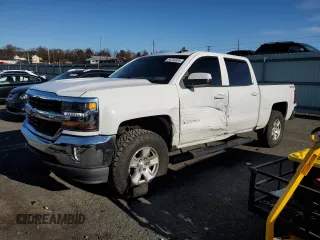 2017 Chevrolet Silverado 1500 LT with VIN 3GCUKREHXHG198169, listed as a Copart auction lot 84744334 with 65,065 mi miles and Salvage Title. Bid and sale history available at DreamBid. Image 1.