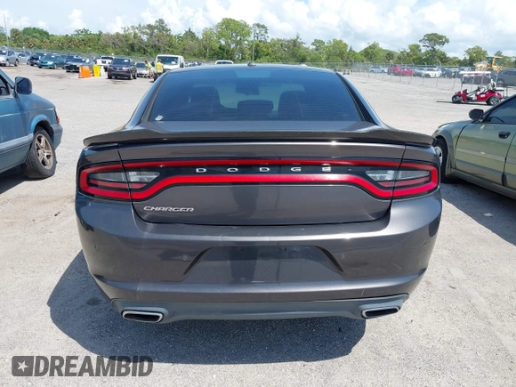 2015 Dodge Charger SE z VIN 2C3CDXBGXFH751491, wystawiony jako IAAI lot #41907243 z przebiegiem 112 545 mil mil oraz . Historia ofert i sprzedaży dostępna na DreamBid. Obrazek 16.