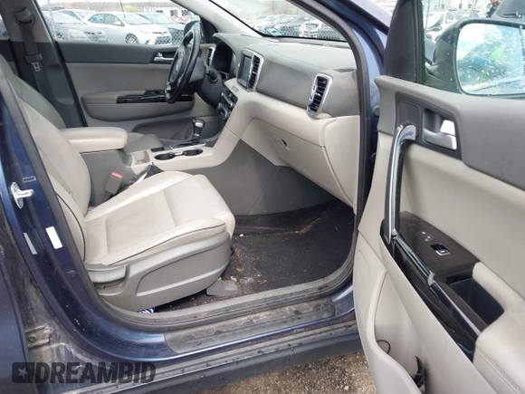 2018 Kia Sportage EX with VIN KNDPNCAC6J7385888, listed as a IAAI auction lot 41875250 with 139,022 mi miles and . Bid and sale history available at carsss.com. Image 5.