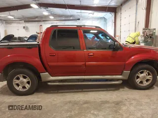 2003 Ford Explorer Sport Trac XLS z VIN 1FMZU67EX3UC27706, wystawiony jako IAAI lot #42214344 z przebiegiem 181 537 mil mil oraz . Historia ofert i sprzedaży dostępna na DreamBid. Obrazek 13.