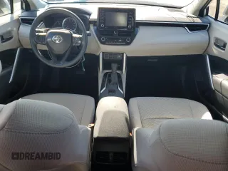 2022 Toyota Corolla Cross L with VIN 7MUAAABG0NV011057, listed as a Copart auction lot 50907545 with 59,328 mi miles and Salvage title. Bid and sale history available at DreamBid. Image 8.