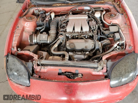 1999 Mitsubishi 3000GT z VIN JA3AM44H3XY001394, wystawiony jako Copart lot #75942814 z przebiegiem 75 146 mil mil oraz Czysty tytuł • Clean title. Historia ofert i sprzedaży dostępna na DreamBid. Obrazek 11.