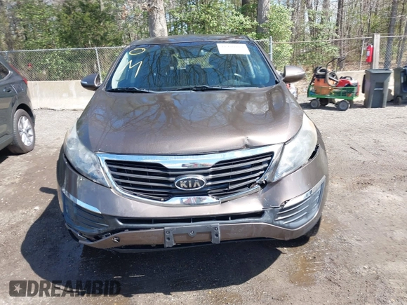 2012 Kia Sportage LX with VIN KNDPBCA27C7293143, listed as a IAAI auction lot 41980919 with 206,457 mi miles and . Bid and sale history available at DreamBid. Image 12.