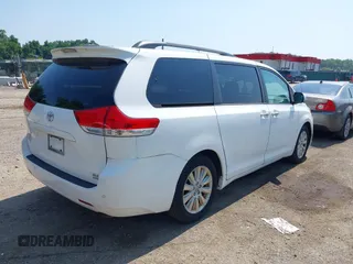 2014 Toyota Sienna Limited with VIN 5TDDK3DC3ES079590, listed as a IAAI auction lot 42694690 with 189,456 mi miles and . Bid and sale history available at DreamBid. Image 4.