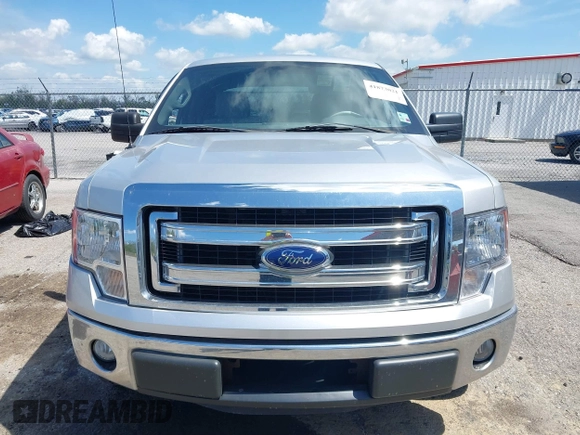2013 Ford F-150 XL with VIN 1FTEW1CM2DFA62107, listed as a IAAI auction lot 41873021 with 149,648 mi miles and . Bid and sale history available at carsss.com. Image 12.