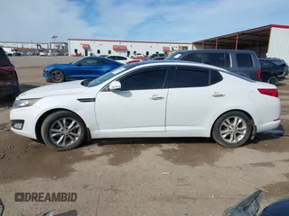2012 Kia Optima EX with VIN 5XXGN4A70CG065145, listed as a IAAI auction lot 41674539 with 107,620 mi miles. Bid and sale history available at carsss.com. Image 14.
