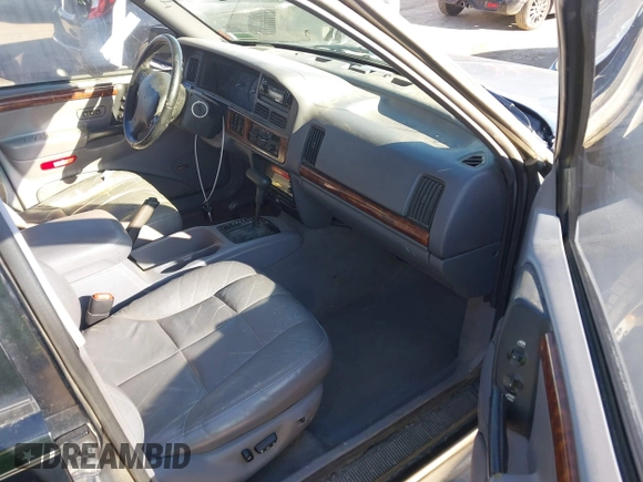 1998 Jeep Grand Cherokee Limited z VIN 1J4GZ78Y3WC105625, wystawiony jako IAAI lot #41742805 z przebiegiem 222 045 mil mil oraz . Historia ofert i sprzedaży dostępna na DreamBid. Obrazek 5.