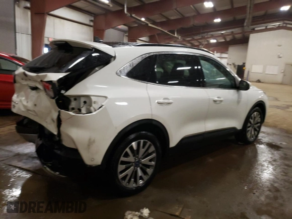 2020 Ford Escape Titanium Hybrid с VIN 1FMCU9DZXLUC27803, выставлен на аукционе Copart как лот 43334755 с пробегом 135 001 миль миль и На запчасти • Non repairable. История ставок и продаж доступна на DreamBid. Изображение 3.