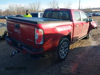 2019 GMC Canyon 4WD Denali with VIN 1GTG6EEN1K1123933, listed as a IAAI auction lot 41663466 with 69,654 mi miles. Bid and sale history available at carsss.com. Image 4.