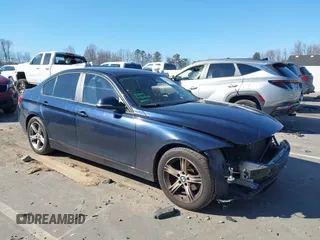 2013 BMW 3 Series 320i with VIN WBA3B1C5XDF461582, listed as a IAAI auction lot 41644855 with 159,363 mi miles. Bid and sale history available at carsss.com. Image 1.