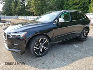 2019 Volvo XC60 R-Design with VIN LYV102RM4KB321874, listed as a Copart auction lot 66815034 with 19,979 mi miles and Salvage Title. Bid and sale history available at carsss.com. Image 1.