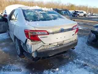 2014 Toyota Camry Hybrid LE with VIN 4T1BD1FK7EU114181, listed as a IAAI auction lot 41294936 with 115,986 mi miles. Bid and sale history available at carsss.com. Image 6.